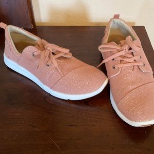 Tom’s sparkly pink shoes